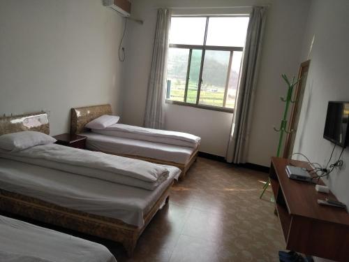 Imagen general del Hostel Wuyuan Jiangling Huatian. Foto 1