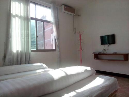 Imagen general del Hostel Wuyuan Jiangling Huatian. Foto 4