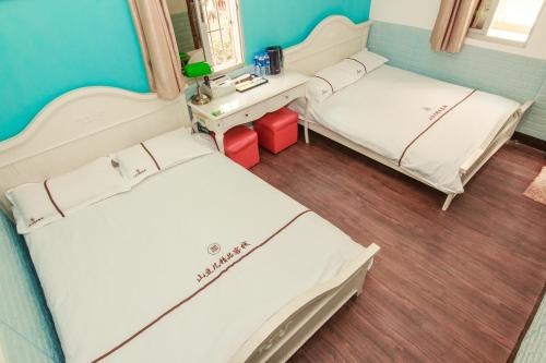 Imagen de la habitación del Hostel Xiamen Shandouji. Foto 7