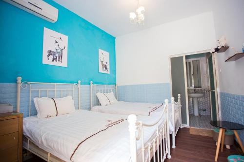 Imagen de la habitación del Hostel Xiamen Shandouji. Foto 8
