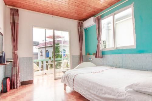 Imagen de la habitación del Hostel Xiamen Shandouji. Foto 9