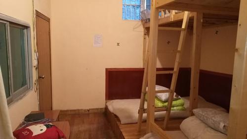 Imagen de la habitación del Hostel Xiangzishen. Foto 9