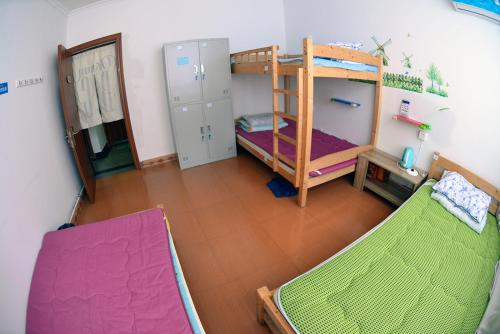 Imagen de la habitación del Hostel Yha Blue Sky International Youth. Foto 7