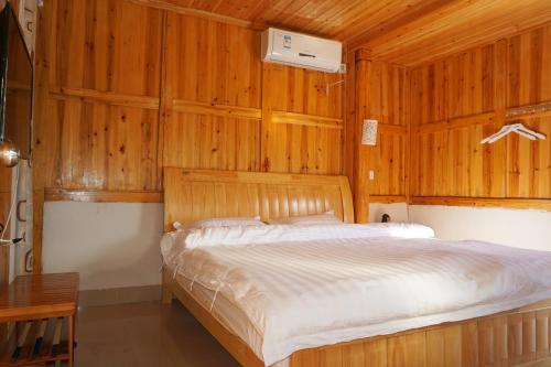 Imagen de la habitación del Hostel Yun Shui Yao Dong Bi Lou. Foto 8