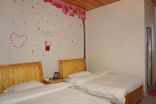 Imagen de la habitación del Hostel Yun Shui Yao Dong Bi Lou. Foto 9