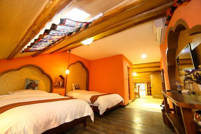 Imagen de la habitación del Hostel Zhangjiajie Nanfang Yinan Hotel. Foto 2