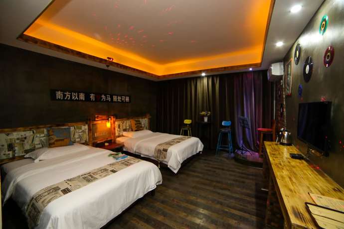 Imagen de la habitación del Hostel Zhangjiajie Nanfang Yinan Hotel. Foto 3