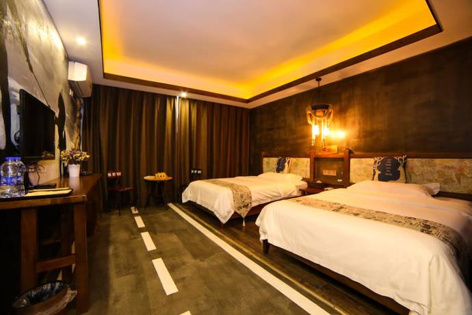 Imagen de la habitación del Hostel Zhangjiajie Nanfang Yinan Hotel. Foto 4