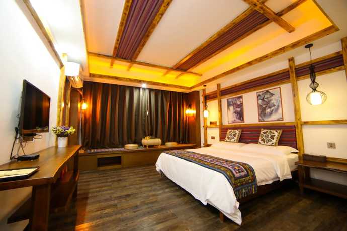 Imagen de la habitación del Hostel Zhangjiajie Nanfang Yinan Hotel. Foto 5