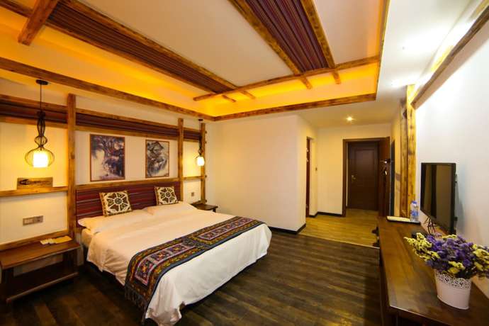 Imagen de la habitación del Hostel Zhangjiajie Nanfang Yinan Hotel. Foto 7