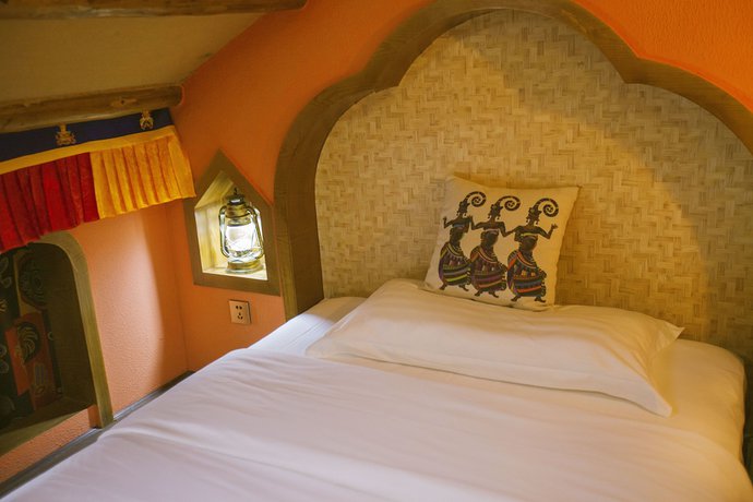 Imagen de la habitación del Hostel Zhangjiajie Nanfang Yinan Hotel. Foto 8