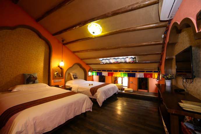 Imagen de la habitación del Hostel Zhangjiajie Nanfang Yinan Hotel. Foto 10