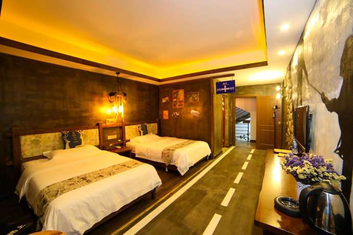 Imagen de la habitación del Hostel Zhangjiajie Nanfang Yinan Hotel. Foto 14