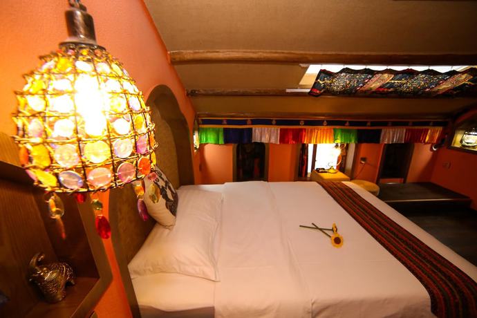 Imagen de la habitación del Hostel Zhangjiajie Nanfang Yinan Hotel. Foto 16