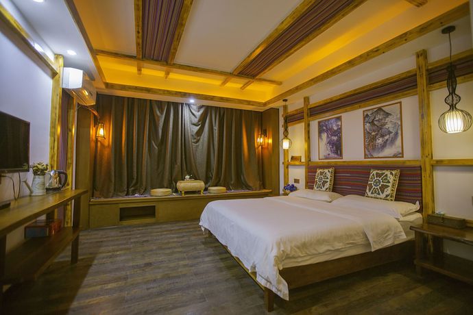 Imagen de la habitación del Hostel Zhangjiajie Nanfang Yinan Hotel. Foto 17