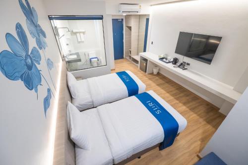 Imagen de la habitación del Hotel โรงแรมสิริรีเจ้นท์. Foto 18