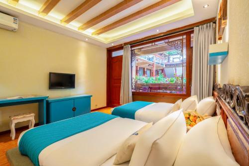 Imagen de la habitación del Hotel 梦之旅观景客栈. Foto 14