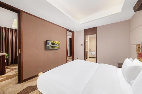 Imagen de la habitación del Hotel 九寨沟星宇国际大酒店. Foto 15