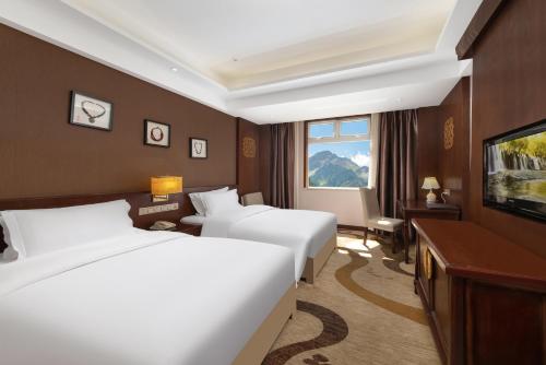 Imagen de la habitación del Hotel 九寨沟星宇国际大酒店. Foto 17