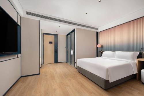 Imagen de la habitación del Hotel 广州番禺万博中心舒与酒店. Foto 14