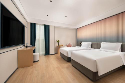 Imagen de la habitación del Hotel 广州番禺万博中心舒与酒店. Foto 17