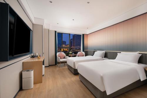 Imagen de la habitación del Hotel 广州番禺万博中心舒与酒店. Foto 19