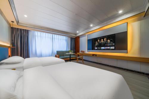 Imagen de la habitación del Hotel 丹阳市富华酒店. Foto 16