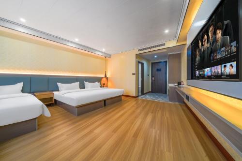 Imagen de la habitación del Hotel 丹阳市富华酒店. Foto 17