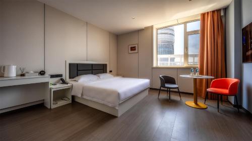 Imagen de la habitación del Hotel 浅予酒店 青岛北站店. Foto 19