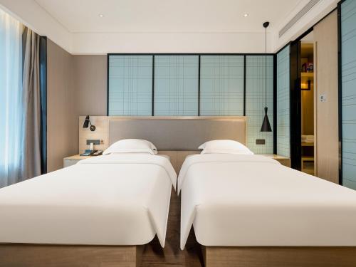 Imagen general del Hotel 宜尚酒店南宁万象城东盟商务区店. Foto 8