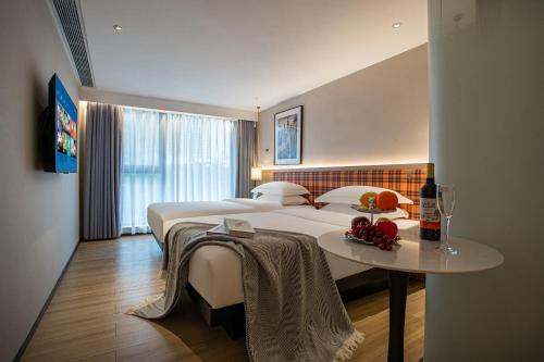 Imagen de la habitación del Hotel 环东漫宜酒店. Foto 17
