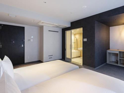 Imagen de la habitación del Hotel 赤羽ホリックホテル. Foto 13