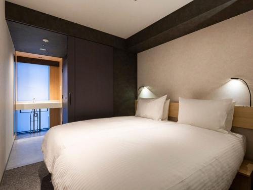 Imagen de la habitación del Hotel 赤羽ホリックホテル. Foto 15