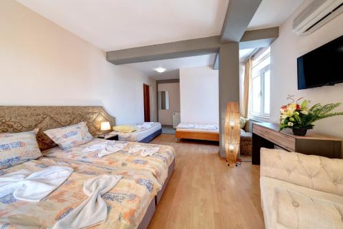 Imagen de la habitación del Hotel Хотел Спектър Палас. Foto 18