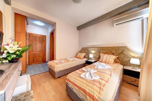Imagen de la habitación del Hotel Хотел Спектър Палас. Foto 19