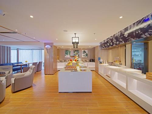 Imagen general del Hotel 宜尚酒店广州番禺长隆板桥地铁站店. Foto 5