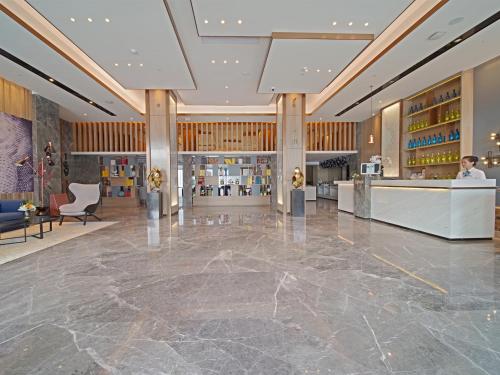 Imagen general del Hotel 宜尚酒店广州番禺长隆板桥地铁站店. Foto 7