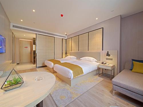 Imagen de la habitación del Hotel 宜尚酒店广州番禺长隆板桥地铁站店. Foto 16
