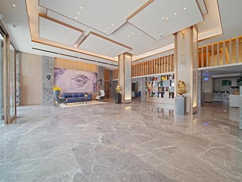 Imagen general del Hotel 宜尚酒店广州番禺长隆板桥地铁站店. Foto 10