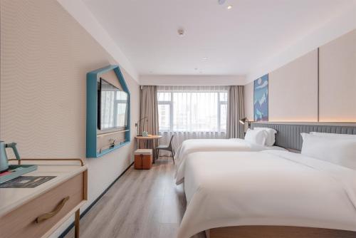 Imagen general del Hotel 宜尚酒店湛江遂溪全丰广场店. Foto 4