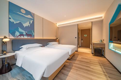 Imagen general del Hotel 宜尚酒店广州白云站聚龙地铁站店. Foto 1