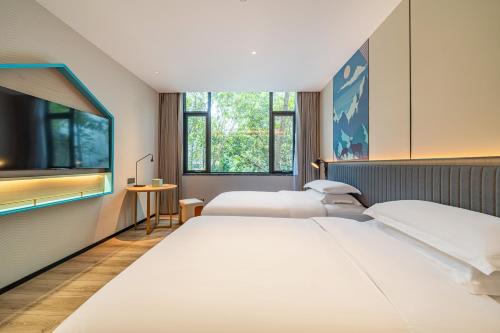 Imagen general del Hotel 宜尚酒店广州白云站聚龙地铁站店. Foto 2