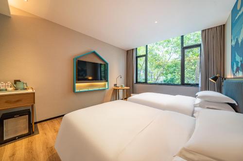 Imagen general del Hotel 宜尚酒店广州白云站聚龙地铁站店. Foto 4