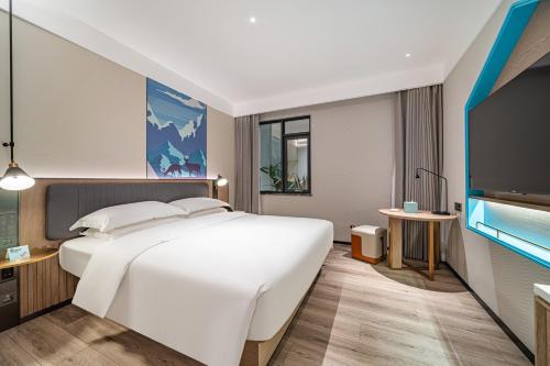 Imagen de la habitación del Hotel 宜尚酒店广州白云站聚龙地铁站店. Foto 19