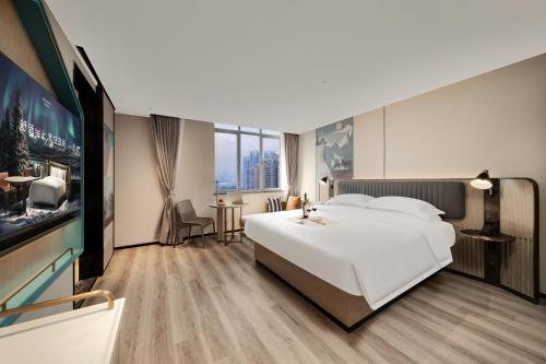 Imagen de la habitación del Hotel 宜尚酒店广州白云站聚龙地铁站店. Foto 20