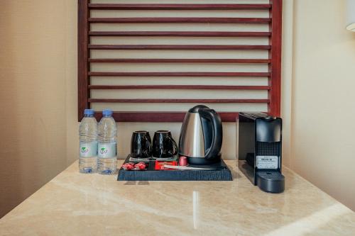 Imagen de la habitación del Hotel فندق إيفا إن. Foto 16