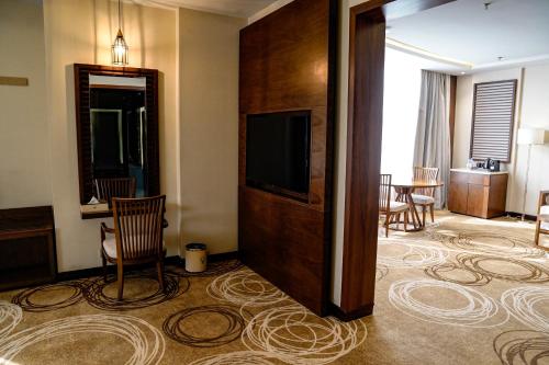 Imagen de la habitación del Hotel فندق إيفا إن. Foto 19