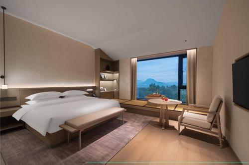 Imagen de la habitación del Hotel 诸暨云满屋艺术酒店. Foto 17