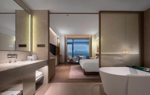 Imagen de la habitación del Hotel 诸暨云满屋艺术酒店. Foto 20