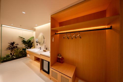 Imagen de la habitación del Hotel 深圳芈白酒店. Foto 17